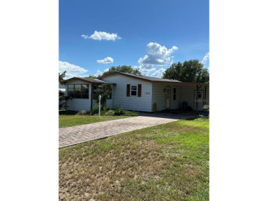 Double wide mobile home with 2 bedrooms, 2 Baths and 1040 sq ft on Orange Blossom Hills Golf and Country Club in Florida - for sale on GolfHomes.com, golf home, golf lot