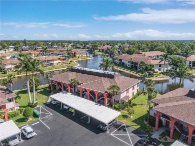 Enjoy peaceful lake views from this beautifully maintained on Riviera Golf Club in Florida - for sale on GolfHomes.com, golf home, golf lot
