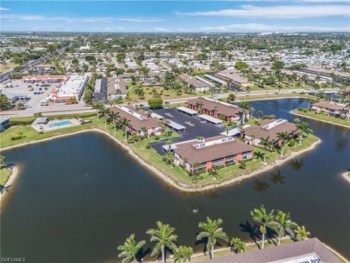Enjoy peaceful lake views from this beautifully maintained on Riviera Golf Club in Florida - for sale on GolfHomes.com, golf home, golf lot