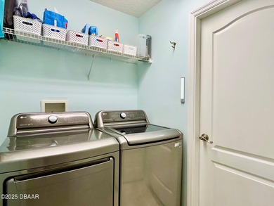 FRESH OUT OF 'HOUSE BEAUTIFUL' AND 'FINE GARDENING'!!! This on Halifax Plantation Golf Club in Florida - for sale on GolfHomes.com, golf home, golf lot