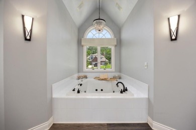 Experience elevated living in this executive estate nestled at on Stone Water Country Club in Michigan - for sale on GolfHomes.com, golf home, golf lot