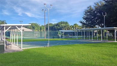 This spacious home is on a private conservation lot. It has an on Monarch At Royal Highlands in Florida - for sale on GolfHomes.com, golf home, golf lot