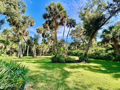 FRESH OUT OF 'HOUSE BEAUTIFUL' AND 'FINE GARDENING'!!! This on Halifax Plantation Golf Club in Florida - for sale on GolfHomes.com, golf home, golf lot