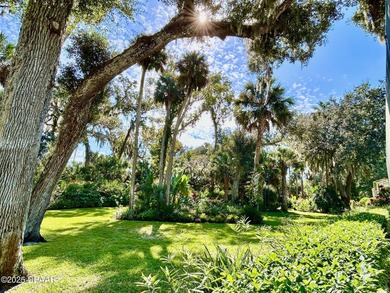 FRESH OUT OF 'HOUSE BEAUTIFUL' AND 'FINE GARDENING'!!! This on Halifax Plantation Golf Club in Florida - for sale on GolfHomes.com, golf home, golf lot