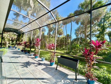 FRESH OUT OF 'HOUSE BEAUTIFUL' AND 'FINE GARDENING'!!! This on Halifax Plantation Golf Club in Florida - for sale on GolfHomes.com, golf home, golf lot