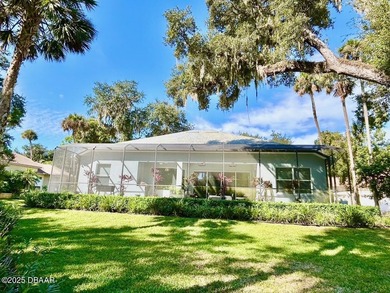 FRESH OUT OF 'HOUSE BEAUTIFUL' AND 'FINE GARDENING'!!! This on Halifax Plantation Golf Club in Florida - for sale on GolfHomes.com, golf home, golf lot