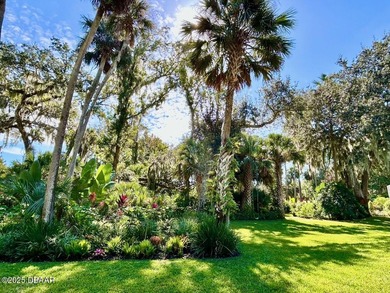 FRESH OUT OF 'HOUSE BEAUTIFUL' AND 'FINE GARDENING'!!! This on Halifax Plantation Golf Club in Florida - for sale on GolfHomes.com, golf home, golf lot