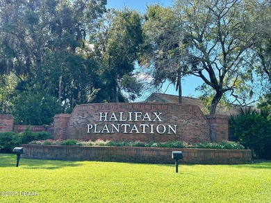 FRESH OUT OF 'HOUSE BEAUTIFUL' AND 'FINE GARDENING'!!! This on Halifax Plantation Golf Club in Florida - for sale on GolfHomes.com, golf home, golf lot