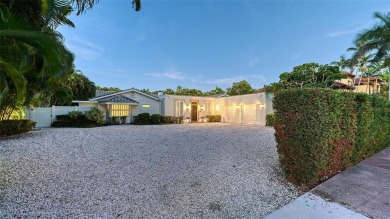 Discover the epitome of luxury living at 103 Fillmore Drive, a on Longboat Key Golf Club in Florida - for sale on GolfHomes.com, golf home, golf lot