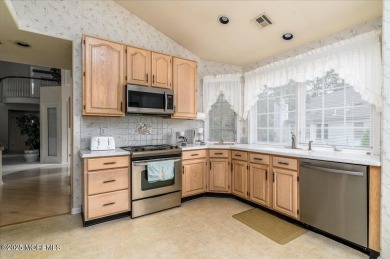 Nestled in the heart of an active and beautifully maintained on Greenbriar Woodlands in New Jersey - for sale on GolfHomes.com, golf home, golf lot