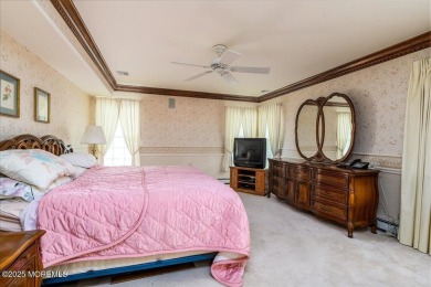 Nestled in the heart of an active and beautifully maintained on Greenbriar Woodlands in New Jersey - for sale on GolfHomes.com, golf home, golf lot