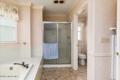 Nestled in the heart of an active and beautifully maintained on Greenbriar Woodlands in New Jersey - for sale on GolfHomes.com, golf home, golf lot