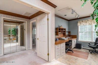 Nestled in the heart of an active and beautifully maintained on Greenbriar Woodlands in New Jersey - for sale on GolfHomes.com, golf home, golf lot