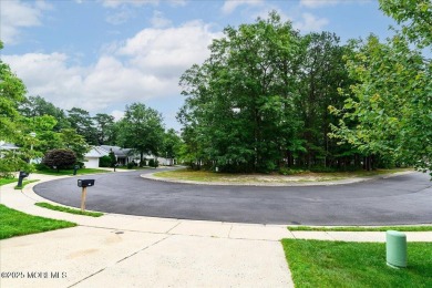 Nestled in the heart of an active and beautifully maintained on Greenbriar Woodlands in New Jersey - for sale on GolfHomes.com, golf home, golf lot