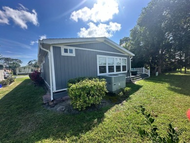 A beautiful 2 bedrooms, 2 bathrooms, Palm Harbor home located on on Del Tura Golf and Country Club in Florida - for sale on GolfHomes.com, golf home, golf lot