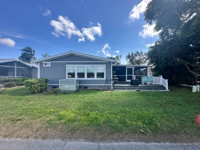 A beautiful 2 bedrooms, 2 bathrooms, Palm Harbor home located on on Del Tura Golf and Country Club in Florida - for sale on GolfHomes.com, golf home, golf lot