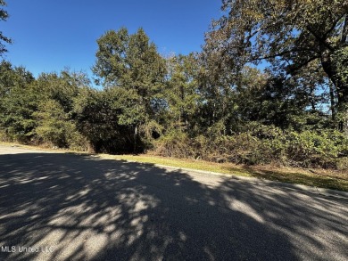 Beautiful, huge lot in coveted Oaks of Pass Christian Golf on The Oaks Golf Club in Mississippi - for sale on GolfHomes.com, golf home, golf lot