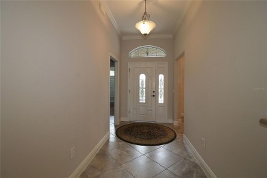 This beautiful Gardenia was custom built by the current owner on The Links of Spruce Creek in Florida - for sale on GolfHomes.com, golf home, golf lot