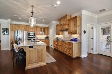 Welcome to life inside the gates of Pecan Plantation, one of on Pecan Plantation Country Club in Texas - for sale on GolfHomes.com, golf home, golf lot