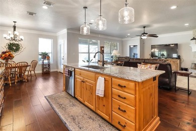 Welcome to life inside the gates of Pecan Plantation, one of on Pecan Plantation Country Club in Texas - for sale on GolfHomes.com, golf home, golf lot