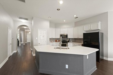Beautifully designed one-story home offering 3 bedrooms, 2 on Woodbridge Golf Club in Texas - for sale on GolfHomes.com, golf home, golf lot