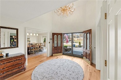 Stunning 1.5-story estate offering 4 bedrooms, 4.1 baths, a 2 on Country Club of Blue Springs in Missouri - for sale on GolfHomes.com, golf home, golf lot