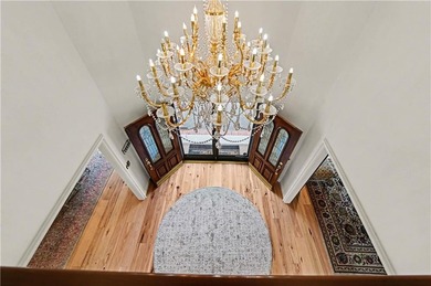 Stunning 1.5-story estate offering 4 bedrooms, 4.1 baths, a 2 on Country Club of Blue Springs in Missouri - for sale on GolfHomes.com, golf home, golf lot