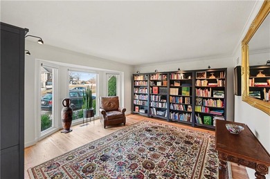 Stunning 1.5-story estate offering 4 bedrooms, 4.1 baths, a 2 on Country Club of Blue Springs in Missouri - for sale on GolfHomes.com, golf home, golf lot