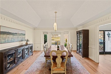 Stunning 1.5-story estate offering 4 bedrooms, 4.1 baths, a 2 on Country Club of Blue Springs in Missouri - for sale on GolfHomes.com, golf home, golf lot