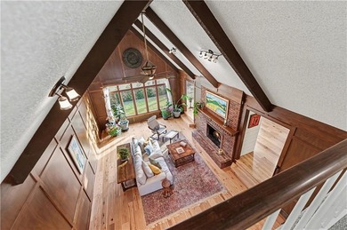 Stunning 1.5-story estate offering 4 bedrooms, 4.1 baths, a 2 on Country Club of Blue Springs in Missouri - for sale on GolfHomes.com, golf home, golf lot