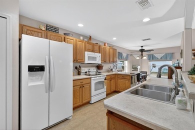 Please pardon the temporarily dormant landscaping -- everything on Summerglen Country Club in Florida - for sale on GolfHomes.com, golf home, golf lot