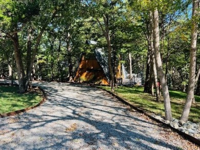 This one of a kind Scandanavian inspired A-frame offers a on Tanglewood Resort in Texas - for sale on GolfHomes.com, golf home, golf lot