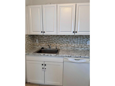 Nice spacious 2 bedroom, 2 bathroom needs some love . Washer and on Kings Point Golf -Flanders Way in Florida - for sale on GolfHomes.com, golf home, golf lot