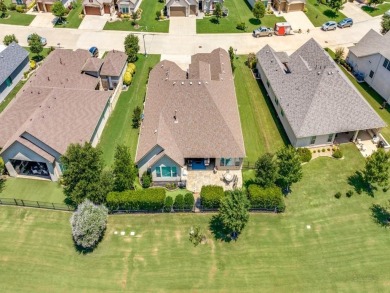 Experience the pinnacle of luxury in this beautiful on Wildhorse Golf Club of Robson Ranch in Texas - for sale on GolfHomes.com, golf home, golf lot