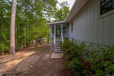 Don't miss this completely updated modern home tucked in the on DeSoto Golf Course in Arkansas - for sale on GolfHomes.com, golf home, golf lot