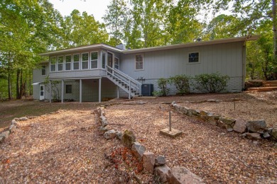 Don't miss this completely updated modern home tucked in the on DeSoto Golf Course in Arkansas - for sale on GolfHomes.com, golf home, golf lot