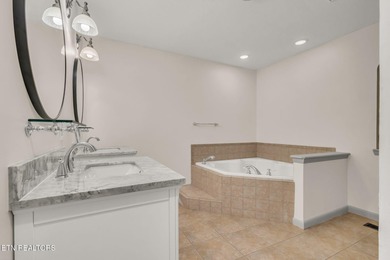 Tucked away on a quiet, private street, this beautifully updated on Heatherhurst Golf Course in Tennessee - for sale on GolfHomes.com, golf home, golf lot