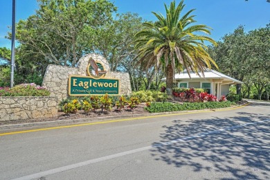 This spacious end unit in beautiful Eaglewood Country Club is on Eagle Wood Golf Course in Florida - for sale on GolfHomes.com, golf home, golf lot