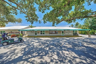 This spacious end unit in beautiful Eaglewood Country Club is on Eagle Wood Golf Course in Florida - for sale on GolfHomes.com, golf home, golf lot