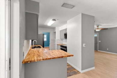Welcome to this beautifully updated 3-bedroom, 1-bathroom on Citrus Springs Country Club in Florida - for sale on GolfHomes.com, golf home, golf lot