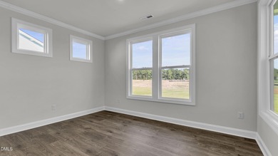 Welcome to 2209 Warbler Drive at Horton Park, located in Apex on Knights Play Golf Center in North Carolina - for sale on GolfHomes.com, golf home, golf lot