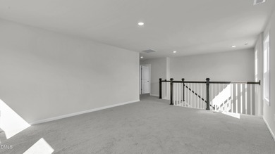 Welcome to 2209 Warbler Drive at Horton Park, located in Apex on Knights Play Golf Center in North Carolina - for sale on GolfHomes.com, golf home, golf lot