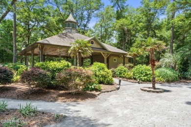 Build your dream home on this beautiful .61-acre wooded lot in on Members Club At St. James Plantation in North Carolina - for sale on GolfHomes.com, golf home, golf lot