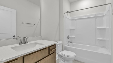 Welcome to 2209 Warbler Drive at Horton Park, located in Apex on Knights Play Golf Center in North Carolina - for sale on GolfHomes.com, golf home, golf lot