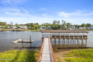 Build your dream home on this beautiful .61-acre wooded lot in on Members Club At St. James Plantation in North Carolina - for sale on GolfHomes.com, golf home, golf lot