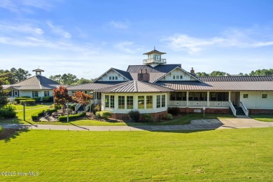Build your dream home on this beautiful .61-acre wooded lot in on Members Club At St. James Plantation in North Carolina - for sale on GolfHomes.com, golf home, golf lot