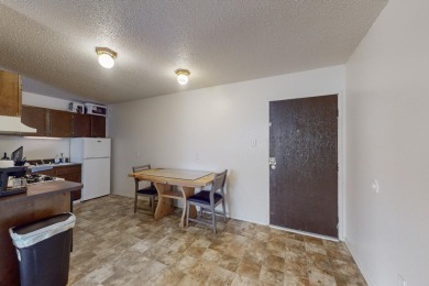 Centrally located townhome in a gated community minutes to on Puerto Del Sol Golf Course in New Mexico - for sale on GolfHomes.com, golf home, golf lot