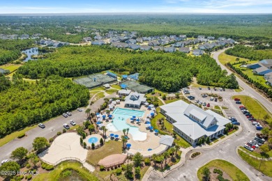 Build your dream home on this beautiful .61-acre wooded lot in on Members Club At St. James Plantation in North Carolina - for sale on GolfHomes.com, golf home, golf lot