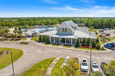 Build your dream home on this beautiful .61-acre wooded lot in on Members Club At St. James Plantation in North Carolina - for sale on GolfHomes.com, golf home, golf lot