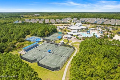 Build your dream home on this beautiful .61-acre wooded lot in on Members Club At St. James Plantation in North Carolina - for sale on GolfHomes.com, golf home, golf lot